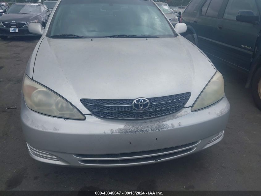 2003 Toyota Camry Le VIN: JTDBE32K130146390 Lot: 40345647