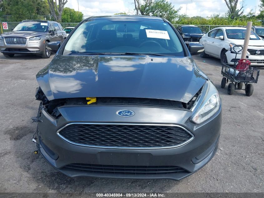 2018 Ford Focus Se VIN: 1FADP3F21JL215531 Lot: 40345904