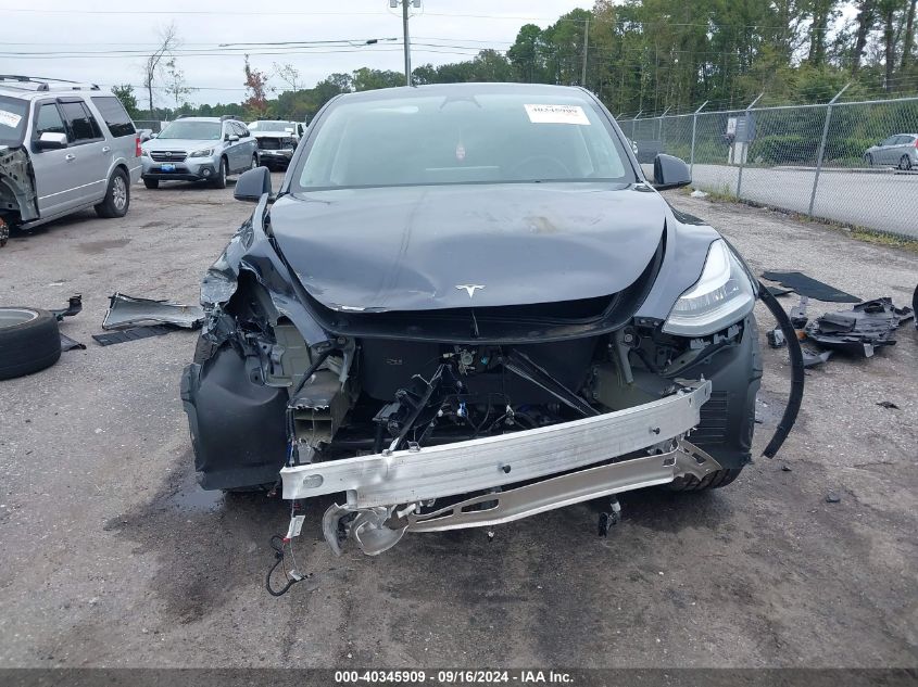 2023 Tesla Model Y Awd/Long Range Dual Motor All-Wheel Drive VIN: 7SAYGDEE8PA087314 Lot: 40345909