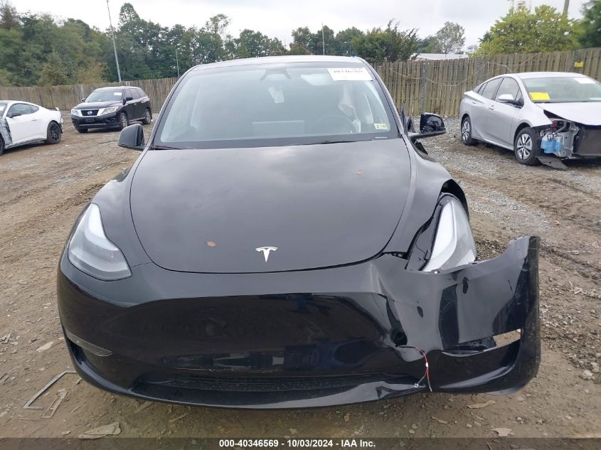 2024 Tesla Model Y Long Range Dual Motor All-Wheel Drive VIN: 7SAYGDEE5RA214619 Lot: 40346569