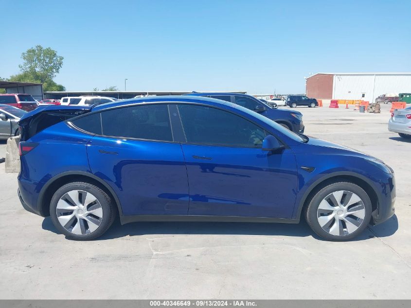 2023 Tesla Model Y Awd/Long Range Dual Motor All-Wheel Drive VIN: 7SAYGDEE9PA206990 Lot: 40346649