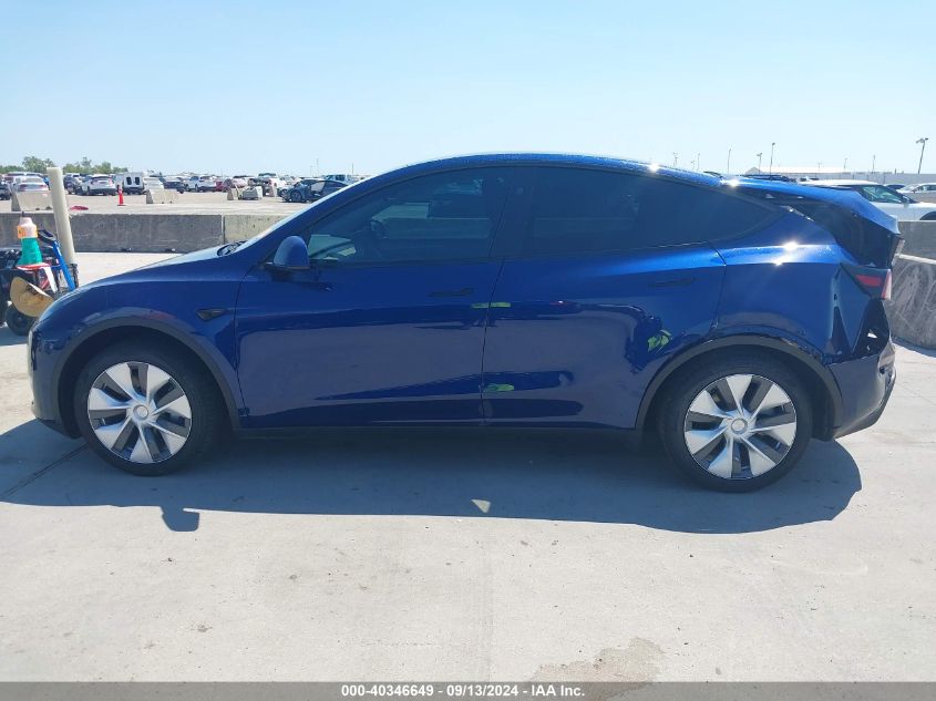 2023 Tesla Model Y Awd/Long Range Dual Motor All-Wheel Drive VIN: 7SAYGDEE9PA206990 Lot: 40346649