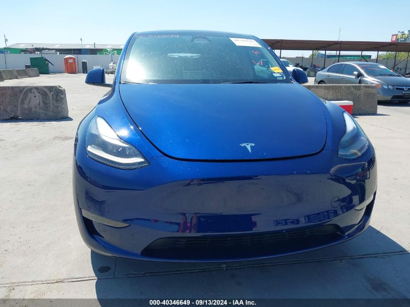 2023 Tesla Model Y VIN: 7SAYGDEE9PA206990 Lot: 40346649