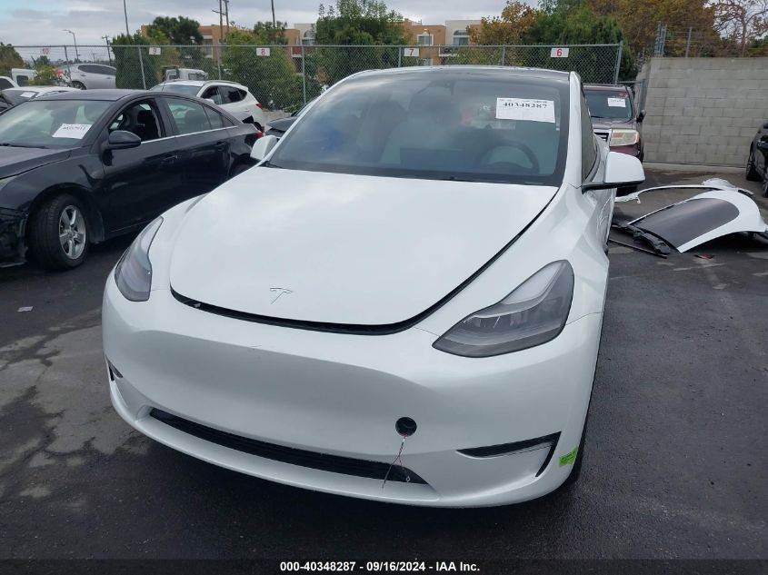 2023 Tesla Model Y Awd/Long Range Dual Motor All-Wheel Drive VIN: 7SAYGDEE6PF633062 Lot: 40348287