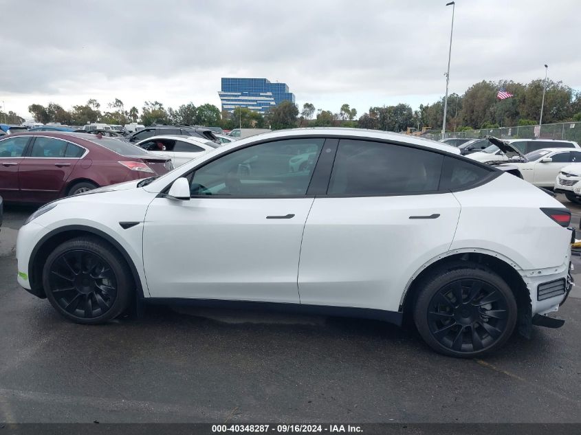 2023 Tesla Model Y Awd/Long Range Dual Motor All-Wheel Drive VIN: 7SAYGDEE6PF633062 Lot: 40348287