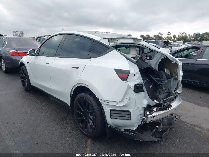 2023 Tesla Model Y Awd/Long Range Dual Motor All-Wheel Drive VIN: 7SAYGDEE6PF633062 Lot: 40348287