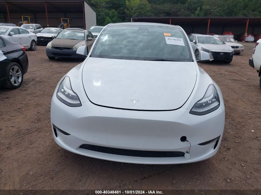 2023 Tesla Model Y Awd/Long Range Dual Motor All-Wheel Drive VIN: 7SAYGDEE3PA060182 Lot: 40348481