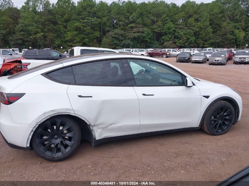 2023 Tesla Model Y Awd/Long Range Dual Motor All-Wheel Drive VIN: 7SAYGDEE3PA060182 Lot: 40348481