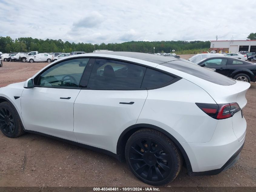 2023 Tesla Model Y Awd/Long Range Dual Motor All-Wheel Drive VIN: 7SAYGDEE3PA060182 Lot: 40348481