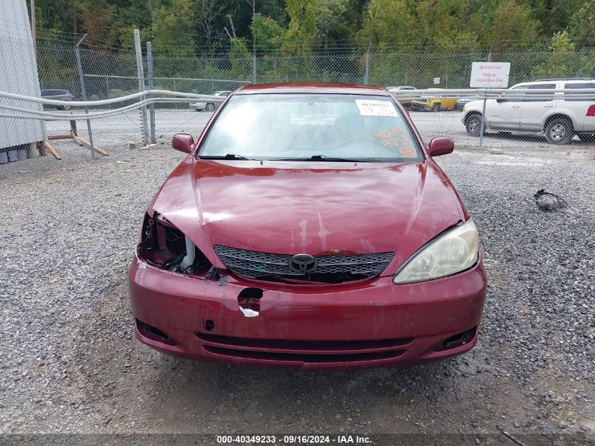 2003 Toyota Camry Le VIN: JTDBE32K030240387 Lot: 40349233