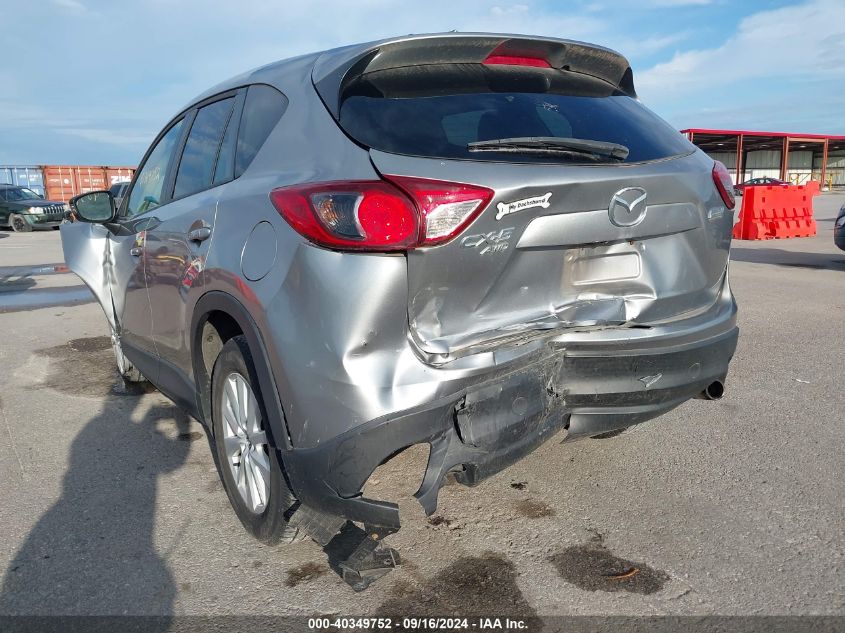 2014 Mazda Cx-5 Touring VIN: JM3KE4CY4E0313859 Lot: 40349752