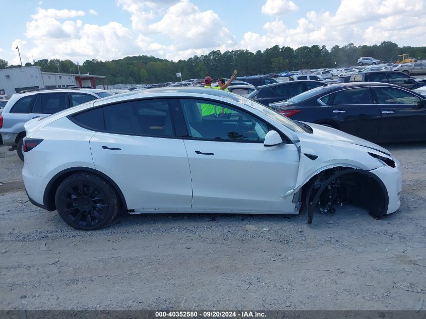 2024 Tesla Model Y Long Range Dual Motor All-Wheel Drive VIN: 7SAYGDEE5RA281298 Lot: 40352580