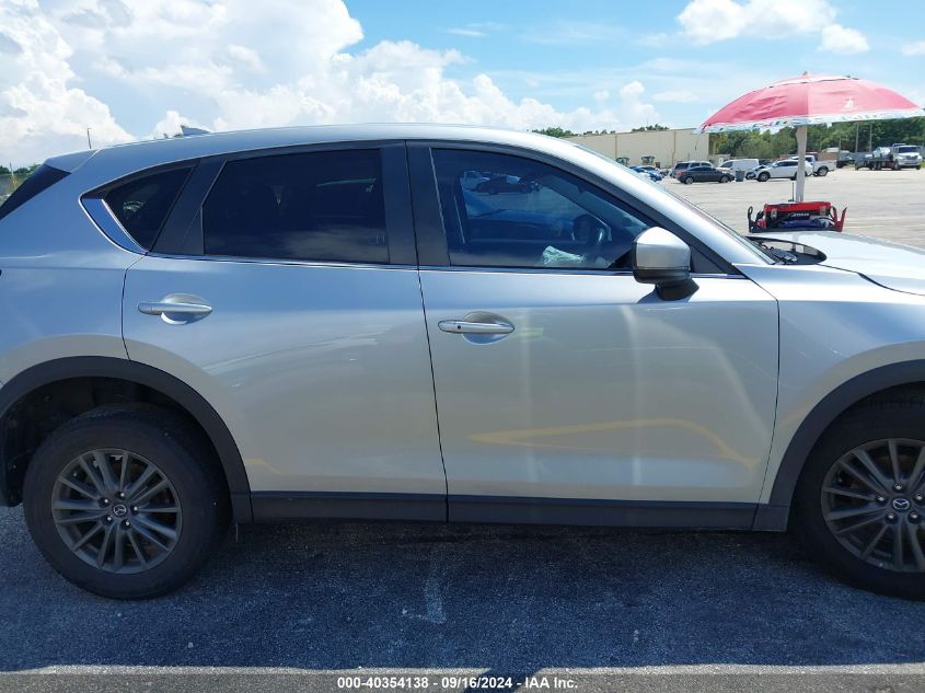 2021 Mazda Cx-5 Touring VIN: JM3KFACM4M0303145 Lot: 40354138