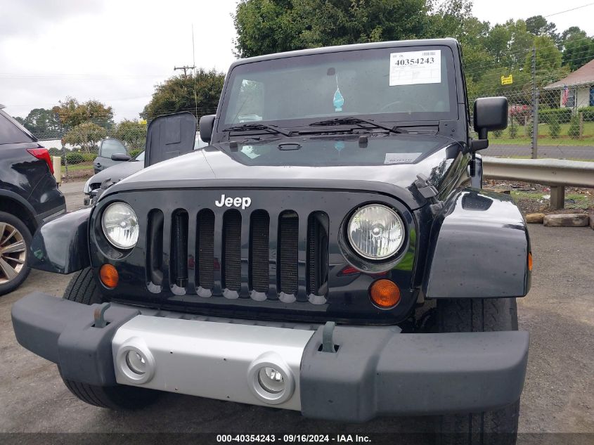 2011 Jeep Wrangler Unlimited Sahara VIN: 1J4HA5H13BL515595 Lot: 40354243