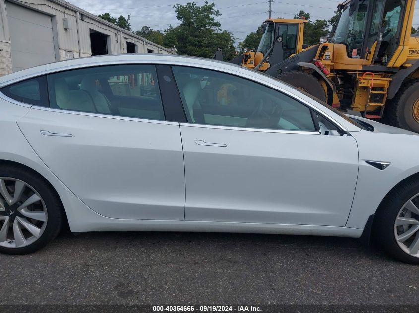 2018 Tesla Model 3 Long Range/Performance VIN: 5YJ3E1EB5JF101231 Lot: 40354666