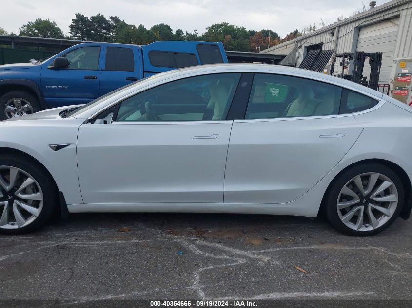 2018 Tesla Model 3 Long Range/Performance VIN: 5YJ3E1EB5JF101231 Lot: 40354666