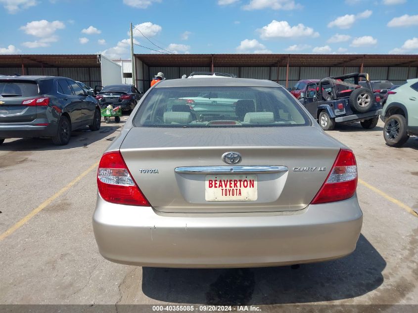 JTDBE32K320110036 2002 Toyota Camry Le