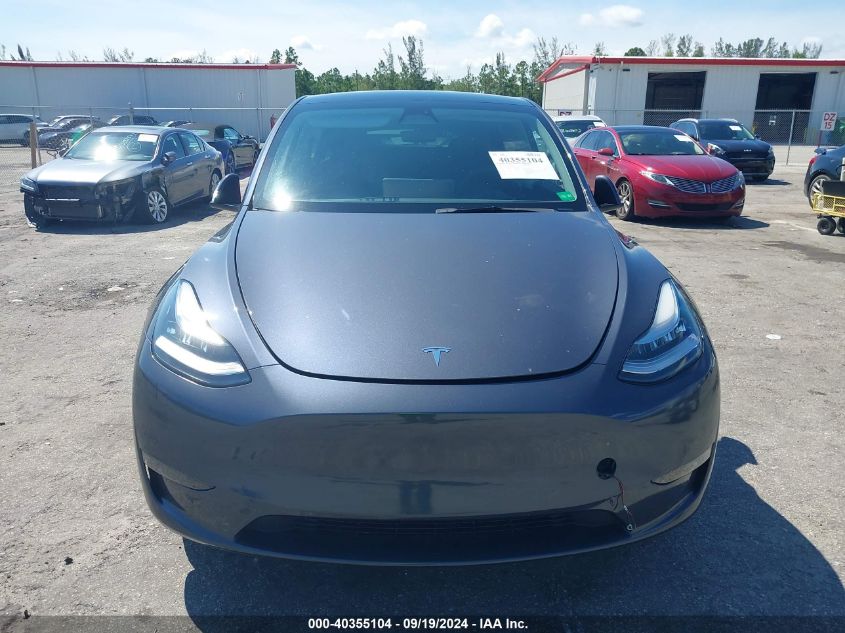 2023 Tesla Model Y Awd/Long Range Dual Motor All-Wheel Drive VIN: 7SAYGDEEXPA086746 Lot: 40355104