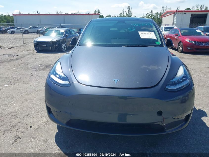 2023 Tesla Model Y Awd/Long Range Dual Motor All-Wheel Drive VIN: 7SAYGDEEXPA086746 Lot: 40355104