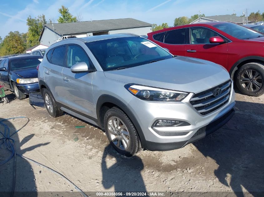 KM8J3CA49JU717193 2018 HYUNDAI TUCSON - Image 1