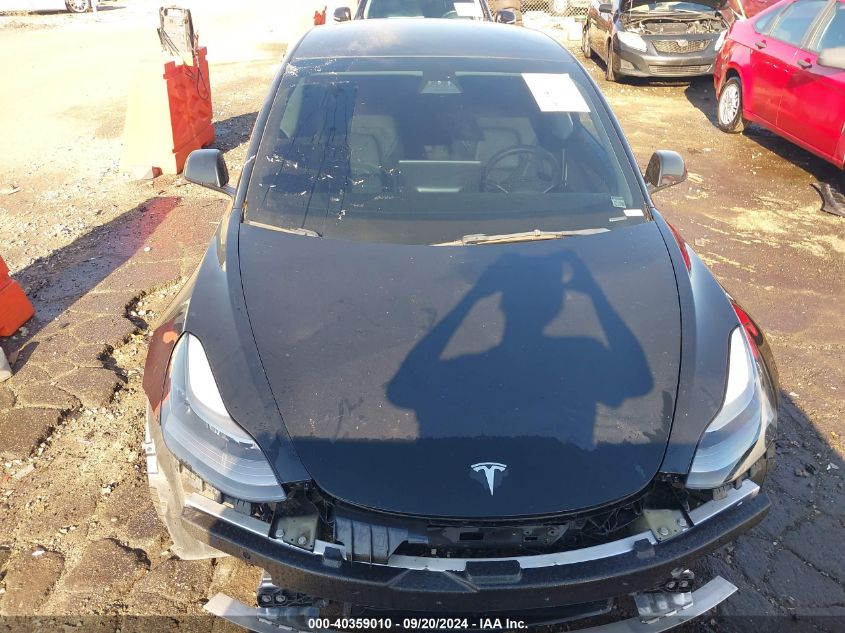 2021 Tesla Model 3 Standard Range Plus Rear-Wheel Drive VIN: 5YJ3E1EA3MF092105 Lot: 40359010