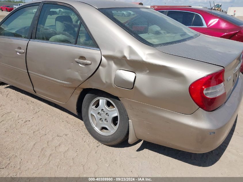 2003 Toyota Camry Le VIN: 4T1BF32K33U557811 Lot: 40359980