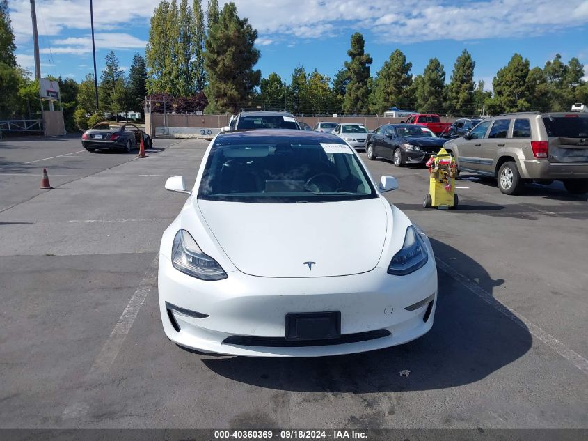 2018 Tesla Model 3 Long Range/Mid Range VIN: 5YJ3E1EAXJF009233 Lot: 40360369