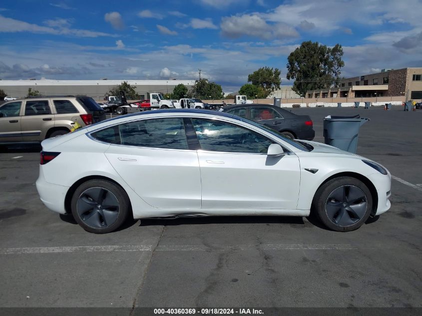 2018 Tesla Model 3 Long Range/Mid Range VIN: 5YJ3E1EAXJF009233 Lot: 40360369