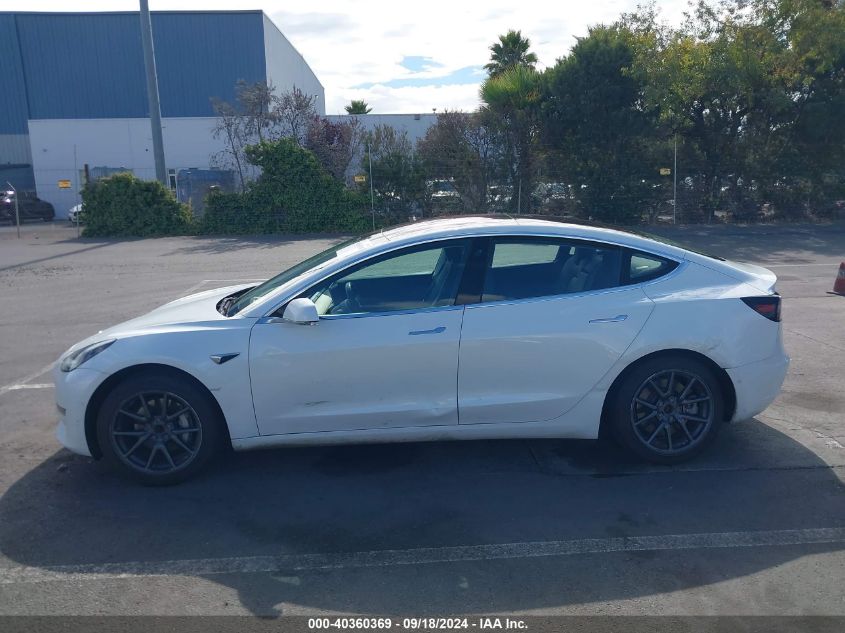 2018 Tesla Model 3 Long Range/Mid Range VIN: 5YJ3E1EAXJF009233 Lot: 40360369