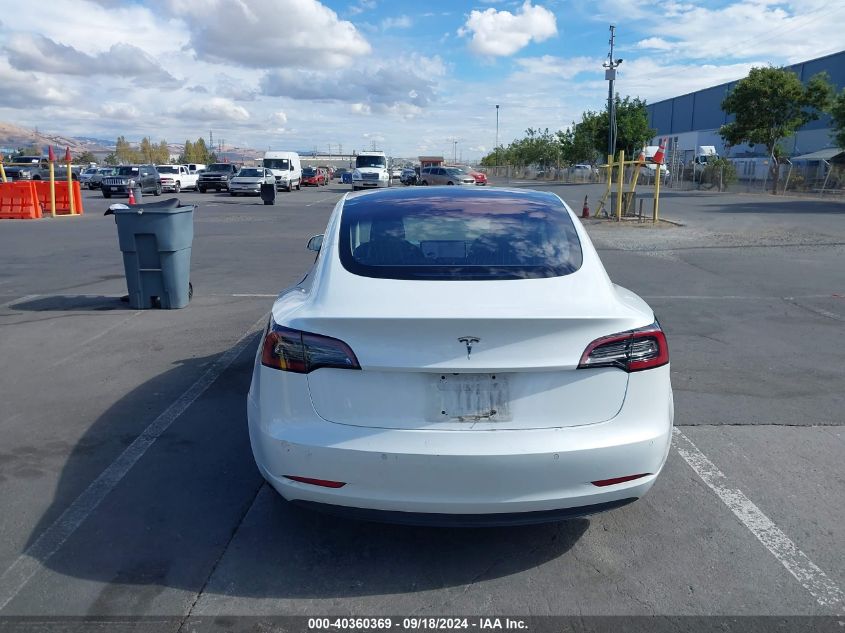 2018 Tesla Model 3 Long Range/Mid Range VIN: 5YJ3E1EAXJF009233 Lot: 40360369