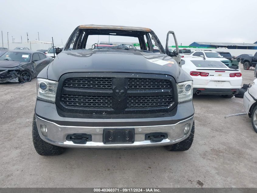 2015 Ram 1500 Laramie VIN: 1C6RR6NM9FS591297 Lot: 40360371