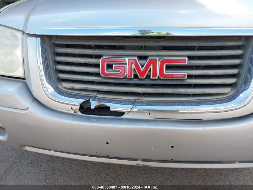 1GKDT13SX42111102 2004 GMC Envoy Sle