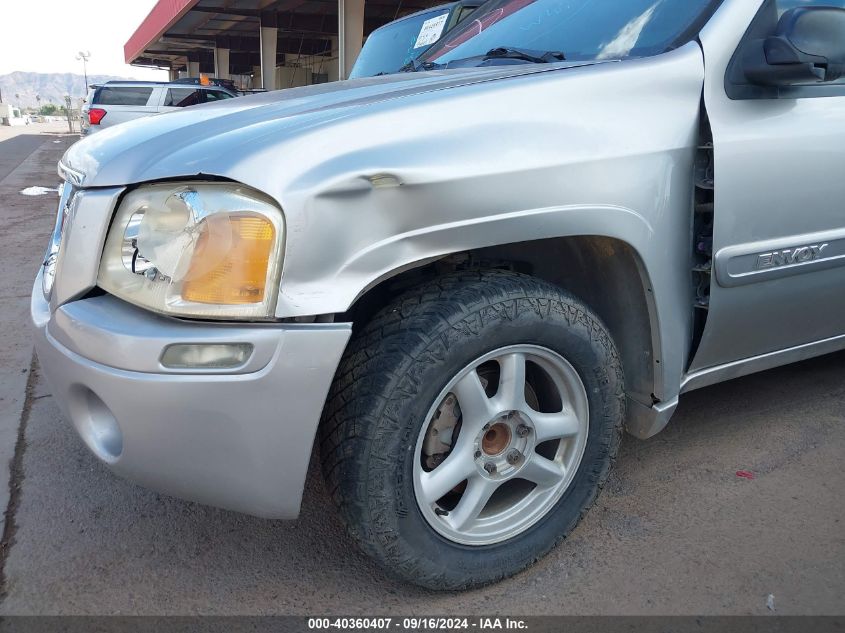 1GKDT13SX42111102 2004 GMC Envoy Sle