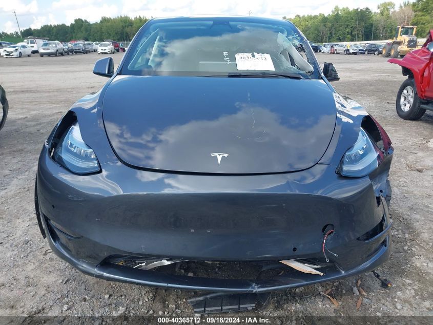 2022 Tesla Model Y Long Range Dual Motor All-Wheel Drive VIN: 7SAYGDEE8NF321855 Lot: 40365712