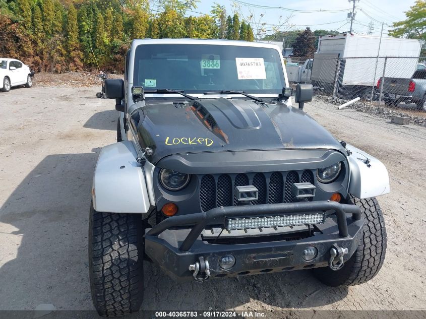 2008 Jeep Wrangler Unlimited Sahara VIN: 1J4GA59158L623784 Lot: 40365783