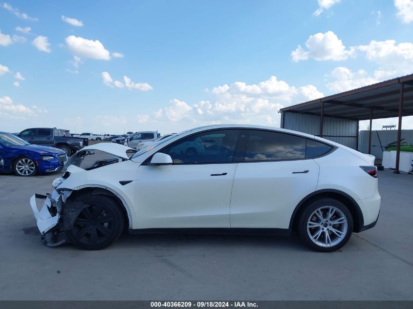 2023 Tesla Model Y Awd/Long Range Dual Motor All-Wheel Drive VIN: 7SAYGDEE6PA091345 Lot: 40366209