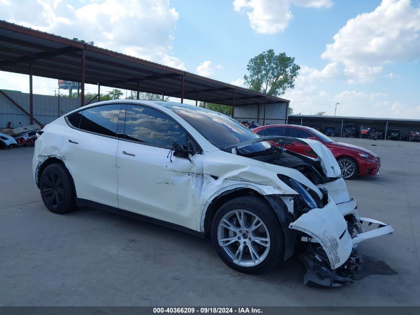 2023 Tesla Model Y Awd/Long Range Dual Motor All-Wheel Drive VIN: 7SAYGDEE6PA091345 Lot: 40366209