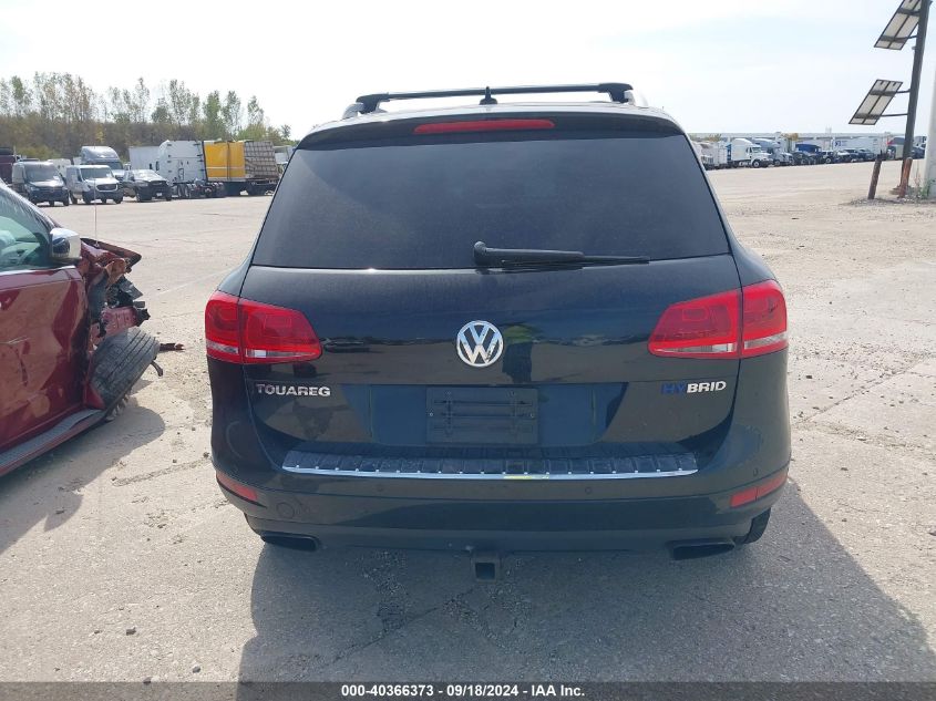 2011 Volkswagen Touareg Hybrid VIN: WVGFG9BP4BD002765 Lot: 40366373