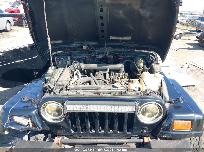 1999 Jeep Wrangler Sahara VIN: 1J4FY49S3XP420328 Lot: 40368445