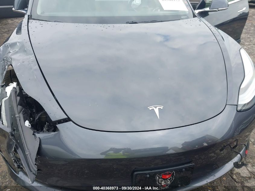 2018 Tesla Model 3 VIN: 5YJ3E1EB6JF077263 Lot: 40368973