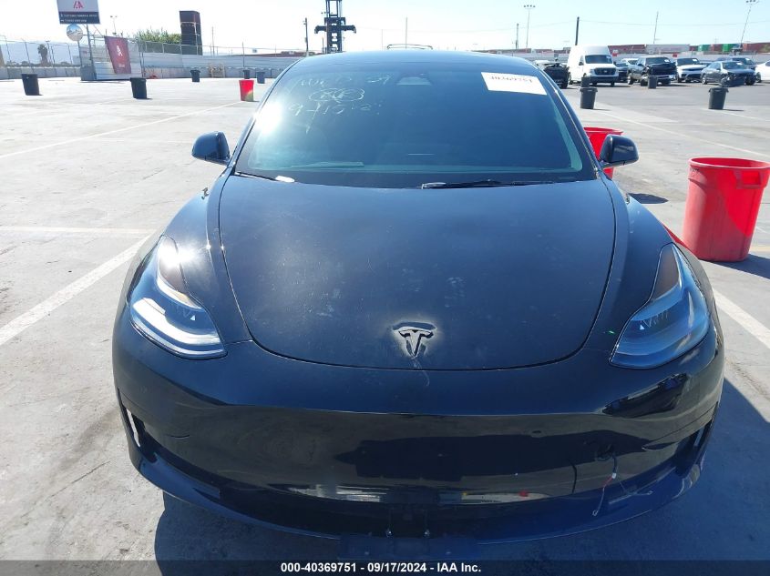 2023 Tesla Model 3 Long Range Dual Motor All-Wheel Drive VIN: 5YJ3E1EB1PF654175 Lot: 40369751