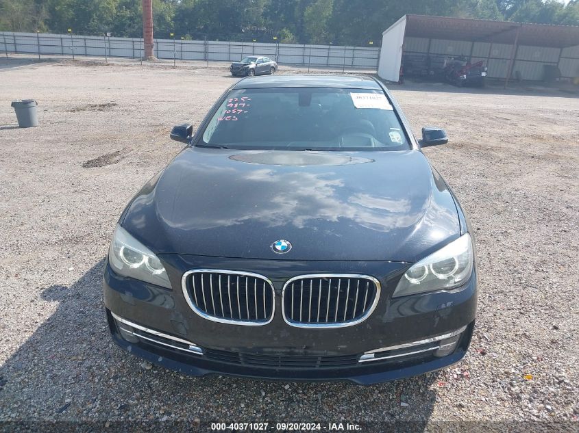 2015 BMW 740I VIN: WBAYA6C51FD827031 Lot: 40371027