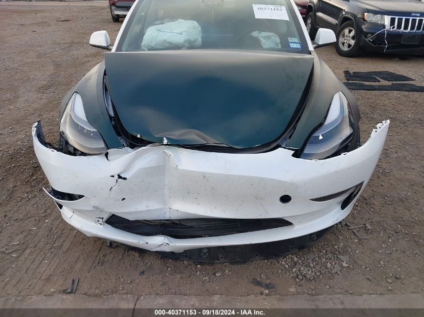 2023 Tesla Model 3 Long Range Dual Motor All-Wheel Drive VIN: 5YJ3E1EB3PF392823 Lot: 40765891