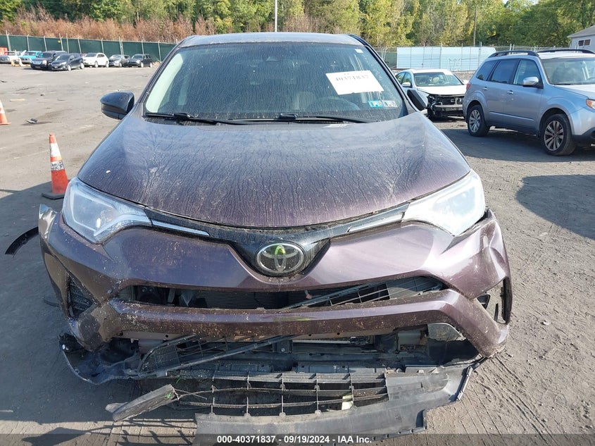 2018 Toyota Rav4 Le VIN: 2T3BFREV8JW738254 Lot: 40371837