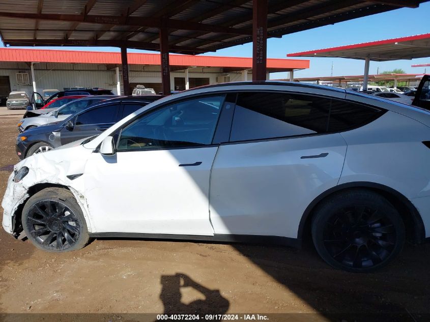 2023 Tesla Model Y Awd/Long Range Dual Motor All-Wheel Drive VIN: 7SAYGDEE0PA136778 Lot: 40372204