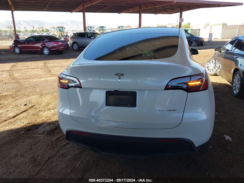 2023 Tesla Model Y Awd/Long Range Dual Motor All-Wheel Drive VIN: 7SAYGDEE0PA136778 Lot: 40372204