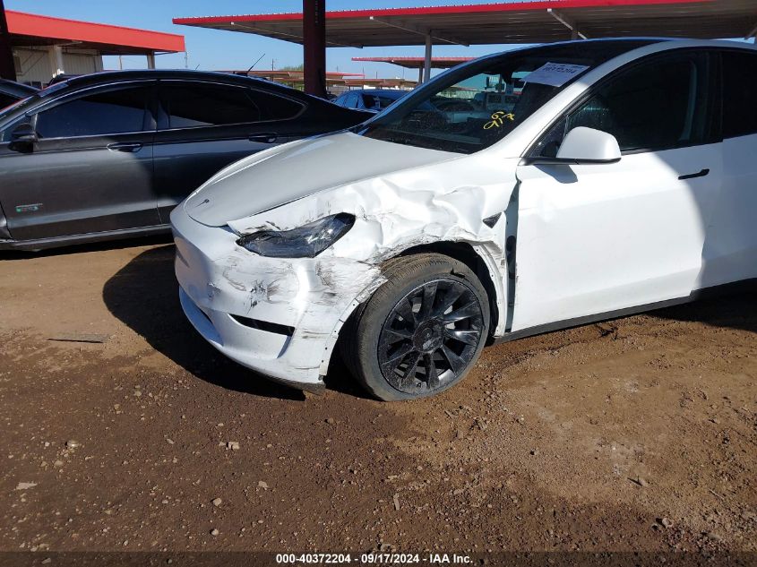 2023 Tesla Model Y Awd/Long Range Dual Motor All-Wheel Drive VIN: 7SAYGDEE0PA136778 Lot: 40372204