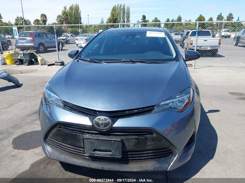 2019 Toyota Corolla Le VIN: 5YFBURHE4KP899875 Lot: 40373944