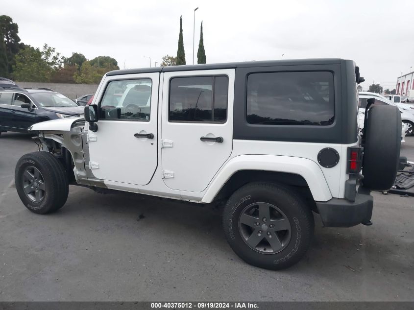 2015 Jeep Wrangler Unlimited Freedom Edition VIN: 1C4BJWDG7FL637037 Lot: 40375012