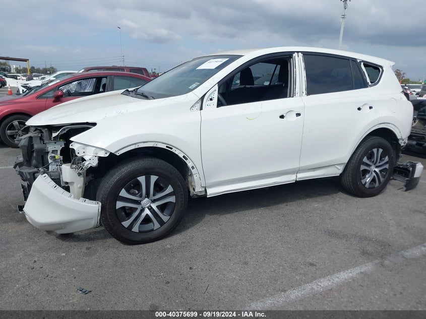 VIN JTMZFREV0JD115688 2018 TOYOTA RAV4 LE